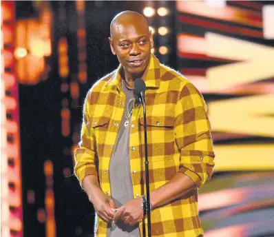  ?? DAVID RICHARD THE ASSOCIATED PRESS
FILE PHOTO ?? Comedian Dave Chappelle was attacked on stage Tuesday in Hollywood. As soon as people start viewing jokes as political or social manifestos, comedy veers toward future tragedy and the power of laughter is muted, writes Vinay Menon.