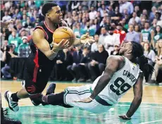  ?? THE ASSOCIATED PRESS/FILES ?? With the NBA’s salary cap projected to be at $99 million, getting a deal done with Toronto Raptors guard Kyle Lowry, left, might be more difficult than originally thought.