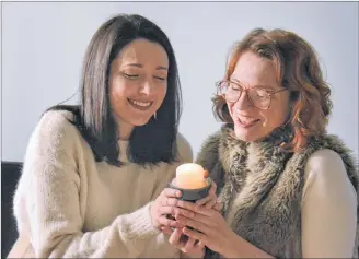  ?? MISTY MORI/SALTWIRE NETWORK ?? Rebecca Parent, left, and Becca Griffin are putting the final touches on “Light, a Solstice Celebratio­n”. Featuring wintertime songs and stories, the show will hit the boards of the Watermark Theatre in North Rustico today at 7:30 p.m.