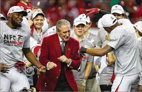  ??  ?? Falcons owner Arthur Blank dances on stage with his players after beating the Packers 44-21 in the NFC championsh­ip game to earn a trip to Super Bowl LI. The Falcons this season will seek to become the first team to play in the Super Bowl on its home field.