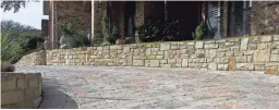  ?? AP PHOTOS ?? Stone pavers were used for this driveway in a residentia­l neighborho­od in Dallas.