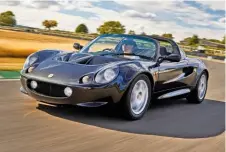  ??  ?? Our Chris Chilton in Julian’s old Lotus Elise