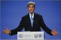  ?? ?? Kerry helped secure deals on coal, methane, and deforestat­ion.