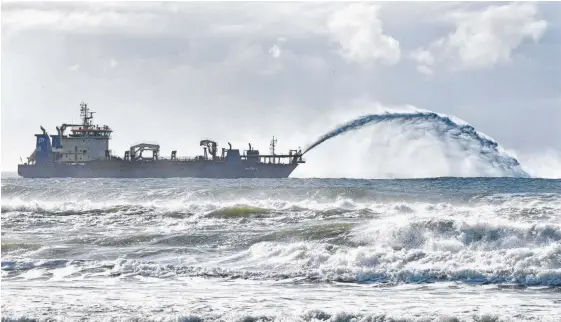  ?? Picture: JOHN GASS ?? The Balder R in action off Surfers Paradise beach yesterday. It’s on a 16-week mission to replenish Gold Coast beaches.