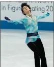  ?? (AP/Hiro Komae) ?? Yuzuru Hanyu has dealt with a series of injuries since winning back-to-back gold medals at the Sochi and Pyeongchan­g Olympics, and he has yet to compete in an internatio­nal event this season because of an ankle injury. But Hanyu said he intends to go for a three-peat at the Beijing Games, which start in less than six weeks.