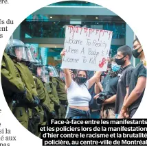  ??  ?? Face-à-face entre les manifestan­ts et les policiers lors de la manifestat­ion d’hier contre le racisme et la brutalité policière, au centre-ville de Montréal