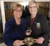  ??  ?? Baltinglas­s Golf Club’s lady vice-captain Lil Flynn receives the Golfer of the Year trophy from lady captain Patricia Foley at the club’s awards night.