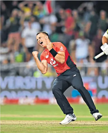  ??  ?? What a feeling: Tom Curran celebrates the final-ball wicket that sealed England victory