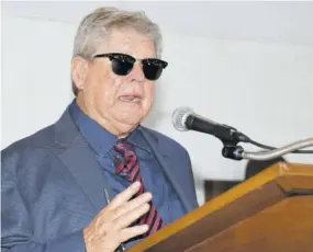  ??  ?? Chairman of Appliance Traders Limited (ATL) Gordon “Butch” Stewart speaking at the company’s 50th anniversar­y church service at Stella Maris Roman Catholic Church.