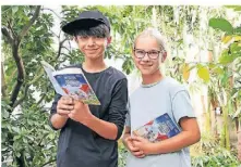  ?? FOTO: ALEXANDER SELL ?? Zum Welttag des Buches bekommen auch Schüler aus Radevormwa­ld das Buch „Mission Roboter – Ein spannender Fall für die Glücksagen­tur“geschenkt.