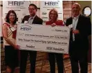  ??  ?? Greater Houston Community Foundation receieved a check for $30,588. Pictured, from left, are Rebecca Hove, GHCF; Charles Ameno, Chevron, HRP’s 2017 president; Kathleen Baker, VERSA Relocation, Worldwide ERC Foundation; and Don Rupe (Daryl Flood...