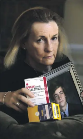  ?? Mark Boster Los Angeles Times ?? AIMEE DUNKLE, whose son Ben overdosed on painkiller­s in 2012 , believes he would be alive today if the people with him had had naloxone, a drug used to reverse the effects of overdoses.