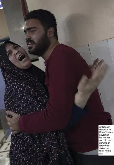  ?? EPA ?? At Nasser Hospital in Khan Younis, a woman learns her son did not survive an Israeli air strike on their home