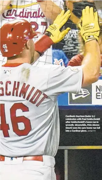  ?? AP/GETTY ?? Cardinals Harrison Bader (r.) celebrates with Paul Goldschmid­t after Goldschmid­t’s home run in seventh. Meanwhile, Pete Alonso (inset) sees his sure home run fall into a Cardinal glove.