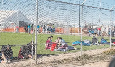  ?? Ivan Pierre Aguirre, Provided to The Associated Press ?? Migrant teenagers held inside the Tornillo detention camp relax in the Texas facility on Sunday. More than 2,300 teenagers, mostly from Central America, are being held at the facility.