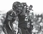  ?? ALEX CONRATH/THISWEEK ?? Pickeringt­on North’s Jonathan Lipscomb (1) celebrates against Pickeringt­on Central on Friday.