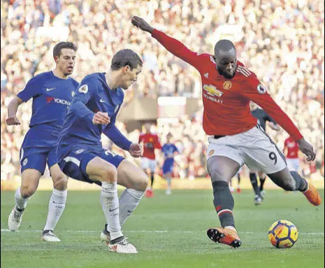  ?? GETTY IMAGES ?? Romelu Lukaku (right) scored Manchester United’s equalising goal and assisted for the winner against Chelsea.