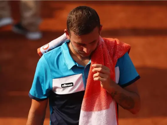  ?? (Getty) ?? Dan Evans will be counting down the days until he can set foot on grass