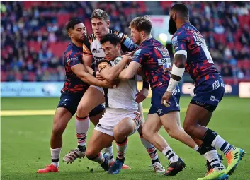  ?? PA/GETTY IMAGES ?? BOXING DAY CLASSIC: Left, Bristol’s Ioan Lloyd and Tigers’ Freddie Steward challenge for the ball during the Gallagher Premiershi­p match at Ashton Gate. Above, Matias Moroni of Tigers is stopped by Charles Piutau and Ioan Lloyd; below, Tigers scrum-half Ben Youngs is tackled while trying to make a break and Marco van Staden evades the challenge from Fritz Harding