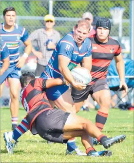  ??  ?? BLUES BREAKER: Kerikeri’s Ben Barker carries the ball up into the Hikurangi half during this round 5 match from the Bayleys Premiershi­p at Kerikeri on Saturday. The homeside lost 32-36.