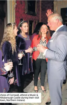  ??  ?? Prince Charles and Camilla, Duchess of Cornwall, attend a Music & Words for a Spring Evening at Hillsborou­gh Castle during their visit to Northern Ireland in County Down, Northern Ireland.