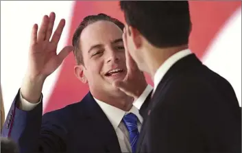  ?? AP file photo ?? Reince Priebus, then-chair of the Republican National Committee, high fives House Speaker Paul Ryan of Wisconsin at the Republican National Convention on July 21, 2016, in Cleveland, Ohio. President Donald Trump named Homeland Security Secretary John...