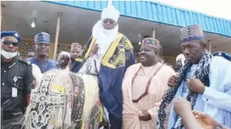  ??  ?? House of representa­tives member, representi­ng Koton-Karfe -Lokoja federal constituen­cy, Hon. Shaba Ibrahim, riding on a horse shortly after turbaned with a traditiona­l title by Ohinoyi of Girinya chiefdom.