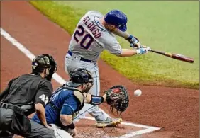  ?? Chris O'meara / Associated Press ?? Pete Alonso of the Mets strikes out in the first inning. He homered his next time up, but New York couldn’t hold onto the 4-1 lead it gave them.