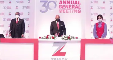  ??  ?? Chairman, Zenith Bank Plc, Mr. Jim Ovia (Centre) flanked by the Group Managing Director/ CEO, Mr. Ebenezer Onyeagwu (Left) and the Deputy Managing Director, Dame (Dr.) Adaora Umeoji (Right) at the 30th Annual General Meeting of the bank held at the Civic Centre, Victoria Island, Lagos yesterday. Photo: Zenith Bank