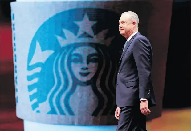  ?? JASON REDMOND / AFP / GETTY IMAGES FILES ?? “Now, in a lot of ways, it’s middle America and the South that presents an opportunit­y,” says Starbucks chief executive Kevin Johnson.