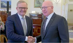  ?? GETTY IMAGES ?? Anthony Albanese shakes hands with the Governor-General, His Excellency General the Honourable David Hurley AC DSC (Retd), yesterday in Canberra.