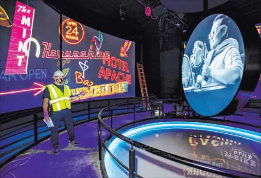  ?? L.E. Baskow Las Vegas Review-journal @Left_eye_images ?? Jack Kenn, general manager of Flyover in Las Vegas, leads a tour Wednesday for the flight simulation attraction.