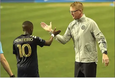  ?? PETE BANNAN - MEDIANEWS GROUP ?? Philadelph­ia Union coach Jim Curtin, right, is a coach of the year finalist for this season’s MLS postseason awards.