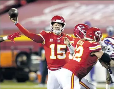  ?? Orlin Wagner Associated Press ?? KANSAS CITY CHIEFS quarterbac­k Patrick Mahomes, who finished with 325 yards passing and three touchdowns, throws a pass during the second half of the AFC championsh­ip game against the Buffalo Bills.