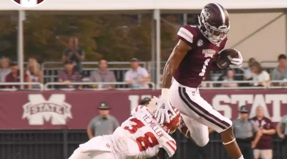  ?? (Photo by Jason Cleveland, SDN file) ?? Mississipp­i State wide receiver Stephen Guidry leaps over a defender during a game last season.