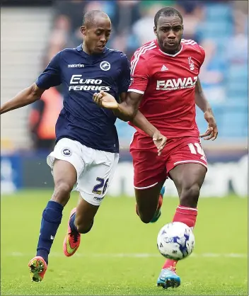  ??  ?? SHOULDER TO SHOULDER: Millwall midfielder Nadjim Abdou and Michail Antonio tussle