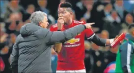  ?? AFP ?? Jose Mourinho (left) had axed Paul Pogba from the post of vicecaptai­ncy.