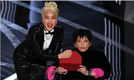  ?? ?? ‘I don’t want people to worry about me’ … Liza Minnelli, right, and Lady Gaga on stage at last month’s Oscars. Photograph: Robyn Beck/AFP/Getty Images