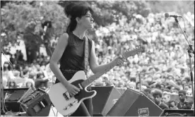  ??  ?? ‘There was just so much to be angry about’ ... Lesley Woods performing with Au Pairs in Leeds, June 1981. Photograph: David Corio/Redferns