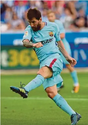  ?? REUTERS PIC ?? Lionel Messi continued to be a vital cog for Barcelona by scoring both goals in the 2-0 win over Alaves on Saturday.