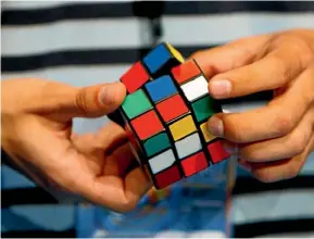  ??  ?? The enduringly popular Rubik’s cube.