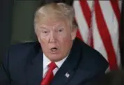  ?? EVAN VUCCI — THE ASSOCIATED PRESS FILE ?? President Donald Trump speaks during a briefing at Trump National Golf Club in Bedminster, N.J. A new Associated Press-NORC poll finds that North Korea’s nuclear weapons developmen­t is spooking most Americans.