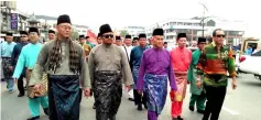  ??  ?? Talib (front, second right) leads the procession. With him on the front row are (from right) Jack, Azhar and Wan Sulaiman.