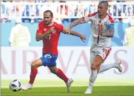  ??  ?? Costa Rica’s forward Marco Urena (L) is marked by Serbia’s defender Aleksandar Kolarov (R) during the Russia 2018 World Cup Group ‘E’ match on Sunday.