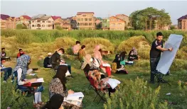  ??  ?? Engineer-turned-teacher Muneer Aalam holds an open-air classe in Srinagar’s Idgah grounds. Mr Aalam hold classes in batches for about 80 students. — H.U. NAQASH