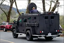  ?? ASSOCIATED PRESS ?? AN ARMORED VEHICLE ARRIVES AT THE VETERANS HOME of California in Yountville, Calif., on Friday. A gunman took at least three people hostage at the largest veterans home in the United States on Friday, leading to a lockdown of the sprawling grounds in...