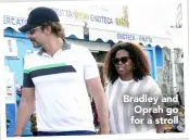  ??  ?? Bradley and Oprah go for a stroll