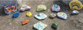  ?? - SUPPLIED ?? The workers at the temporary hospital in Burlington were touched by members of the community who dropped off rocks with inspiratio­nal messages.