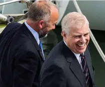  ??  ?? Smiles...Prince Andrew arrives in Dartmouth yesterday