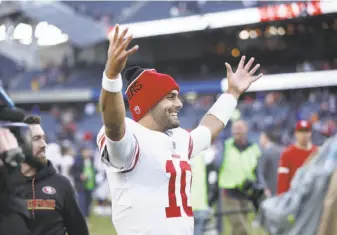  ?? Photos by Joe Robbins / Getty Images ?? Quarterbac­k Jimmy Garoppolo capped off his first performanc­e as a 49ers starter by leading a game-winning, 86-yard drive in the game’s closing minutes to secure a 15-14 comeback win.